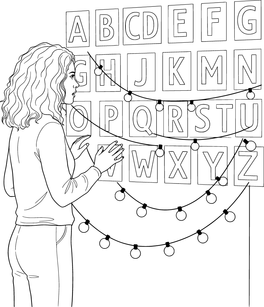 Joyce Byers Beside Alphabet Wall And Christmas Lights